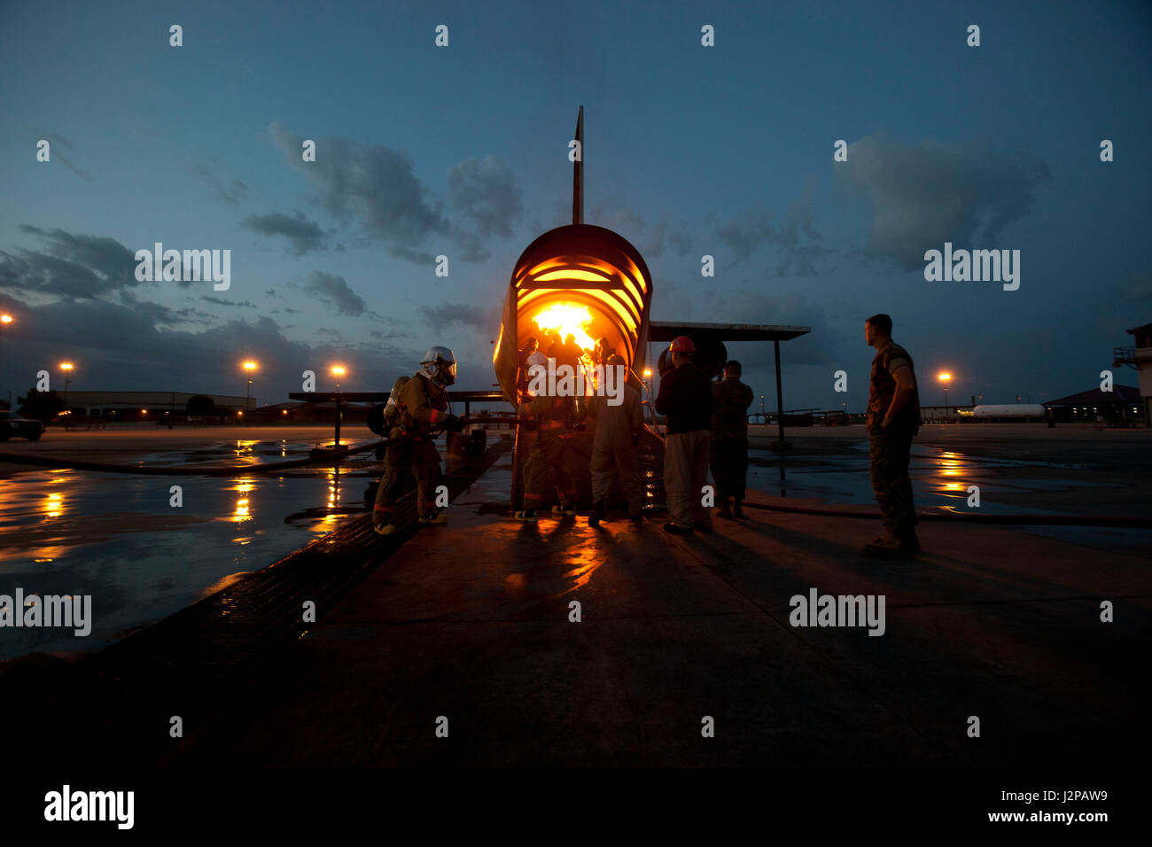 U.S. Marines assigned to the Fire Protection Apprentice Course, Marine detachment Goodfellow, conduct training exercises on a simulated downed aircraft at Joint Airforce Base Goodfellow, Texas, March 24, 2017. The mission of Marine Detachment Goodfellow is to train Marines in the occupational fields of Fire Protection and Signals Intelligence for the Fleet Marine Force. (U.S. Marine Corps photo by Lance Cpl. Jose Villalobosrocha) Stock Photo