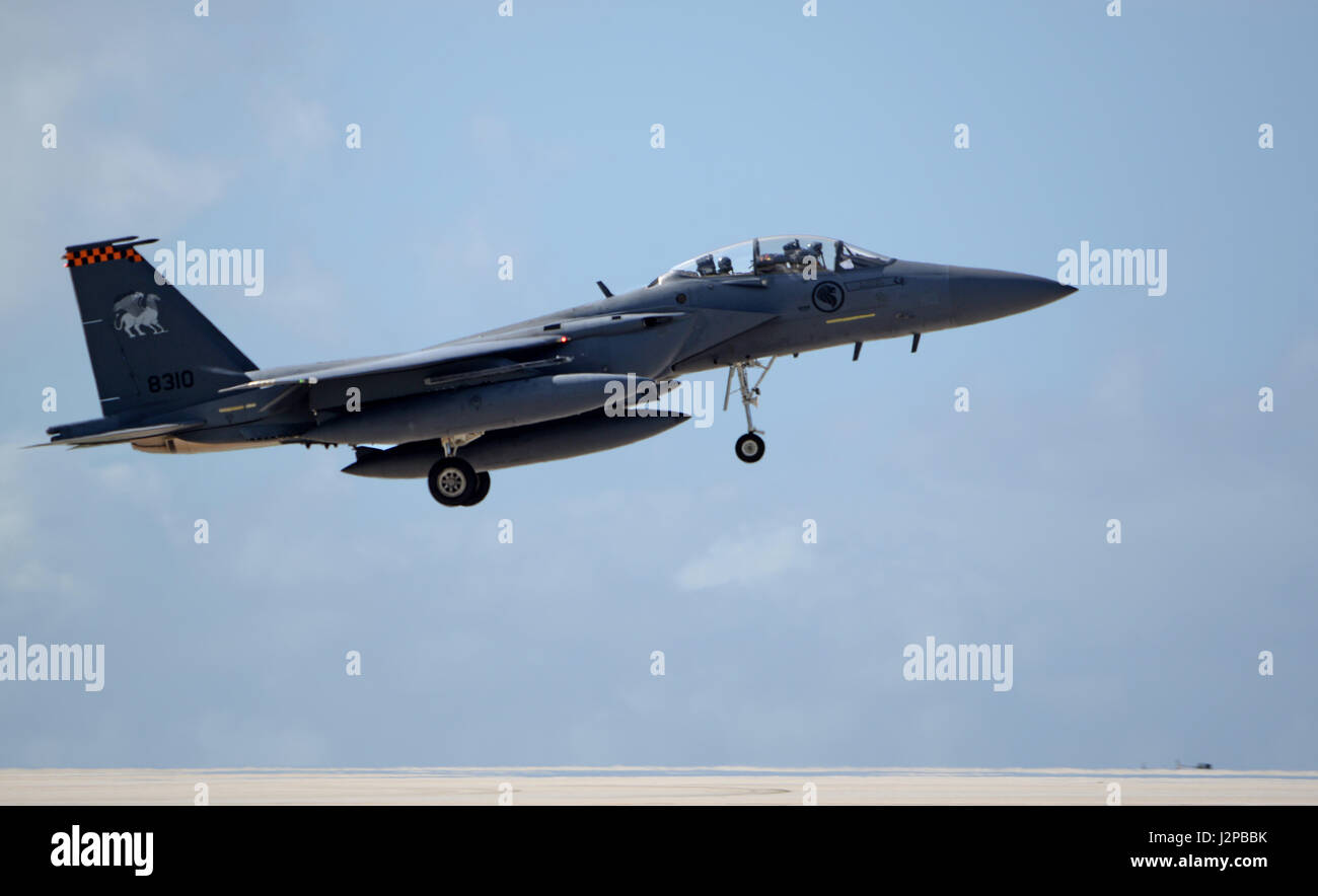 A Republic of Singapore Air Force F-15SG aircraft lands April 10, 2017, at Andersen Air Force Base, Guam. The RSAF deployed to this U.S. Air Force base to conduct quality bilateral training for aircrew and maintenance personnel to sharpen their skills and strengthen ties with partners in the Pacific. (U.S. Air Force Airman 1st Class Gerald R. Willis/Released) Stock Photo