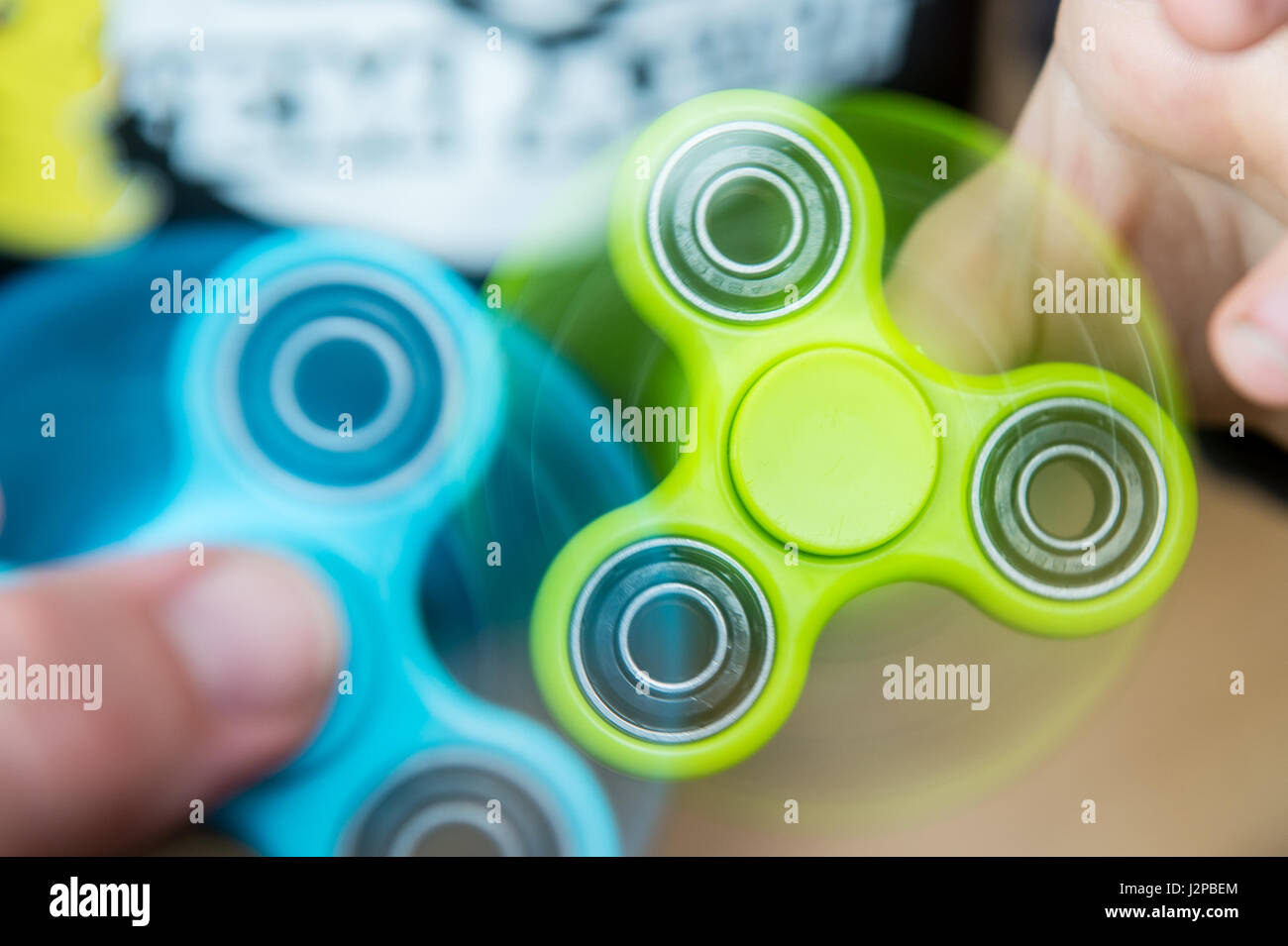 Fidget spinners hi-res stock photography and images - Alamy