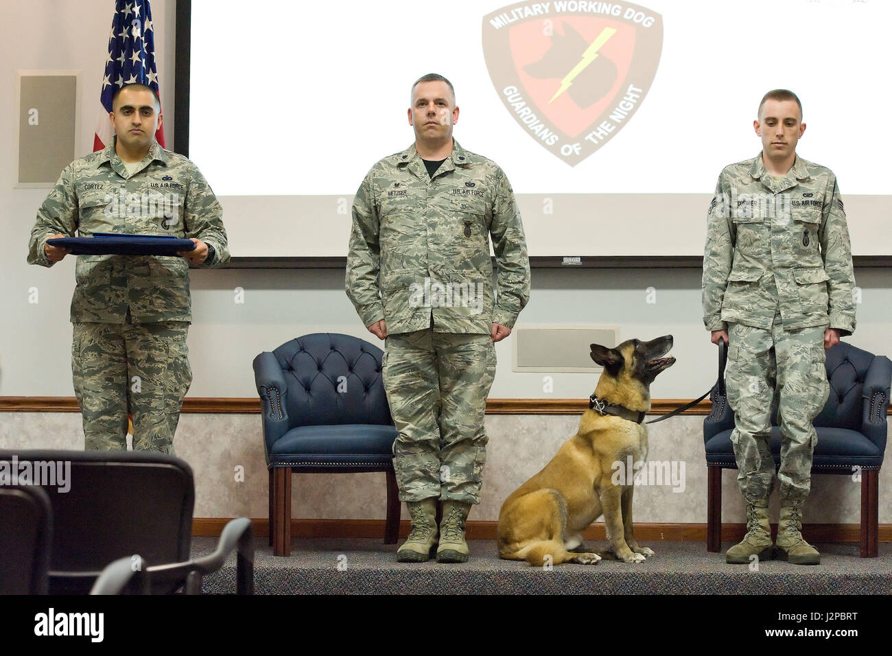 Military Working Dog Cuervo, N622, assigned to the 436th Airlift Wing, 436th Security Forces Squadron, retires from the U.S. Air Force during a ceremony April 14, 2017, on Dover Air Force Base, Del. Between April 2, 2010 to April 14, 2017, MWD Cuervo performed admirably both on the installation and during two deployments in support of Operations Inherent Resolve and Freedom Sentinel. While stateside, he searched over 60,000 commercial vehicles, conducted over 1,500 Random Antiterrorism Measures, and over 6,000 hours of patrol. During his deployments, MWD Cuervo searched a combined total of ove Stock Photo