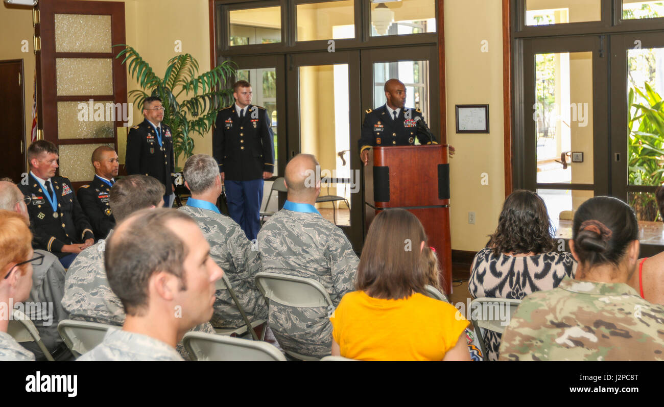 The commander of the 94th Army Air and Missile Defense Command, Brig. Gen. Sean A. Gainey, addresses the audience during the 94th AAMDC Knowlton Awards Ceremony held at the Ka Makani Community Center, Joint Base Pearl Harbor-Hickam, Hawaii April 19. The Knowlton Award was established in June 1995 and recognizes individuals for making significant contributions during their careers to the Military Intelligence Corps. Stock Photo