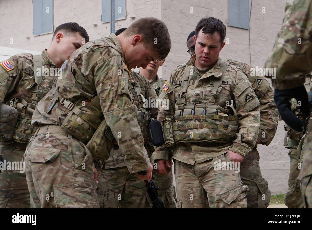 A Soldier performs a weapon clearing operating procedure. The Joint ...