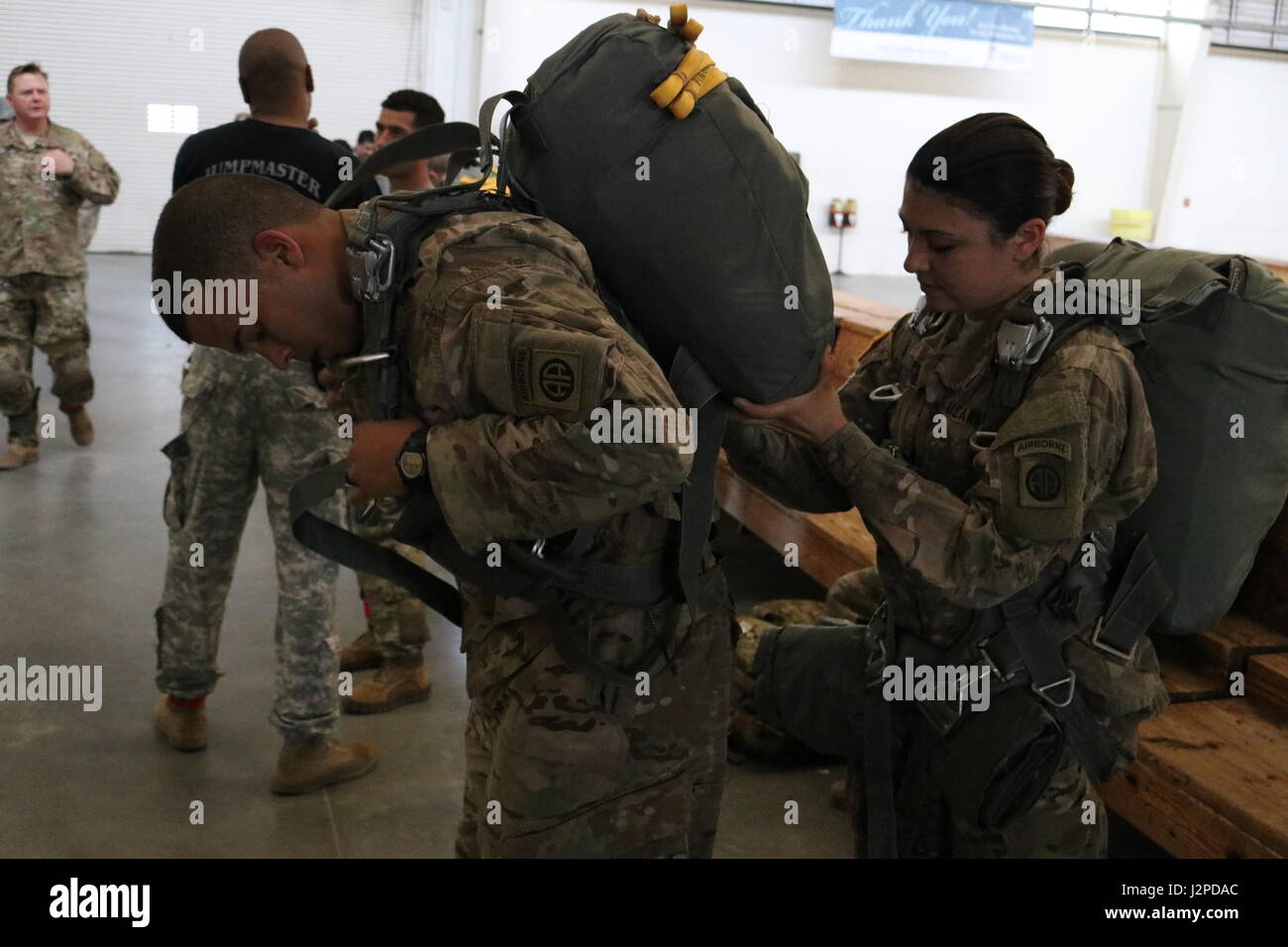 U.S. Army Spc. Yena Tremayne, right, a U.S. Soldier assigned to the ...