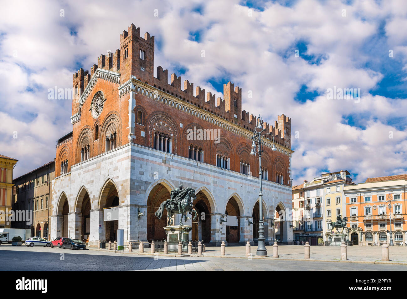 Piacenza Italy. Piazza Cavalli Square horses and palazzo Gotico