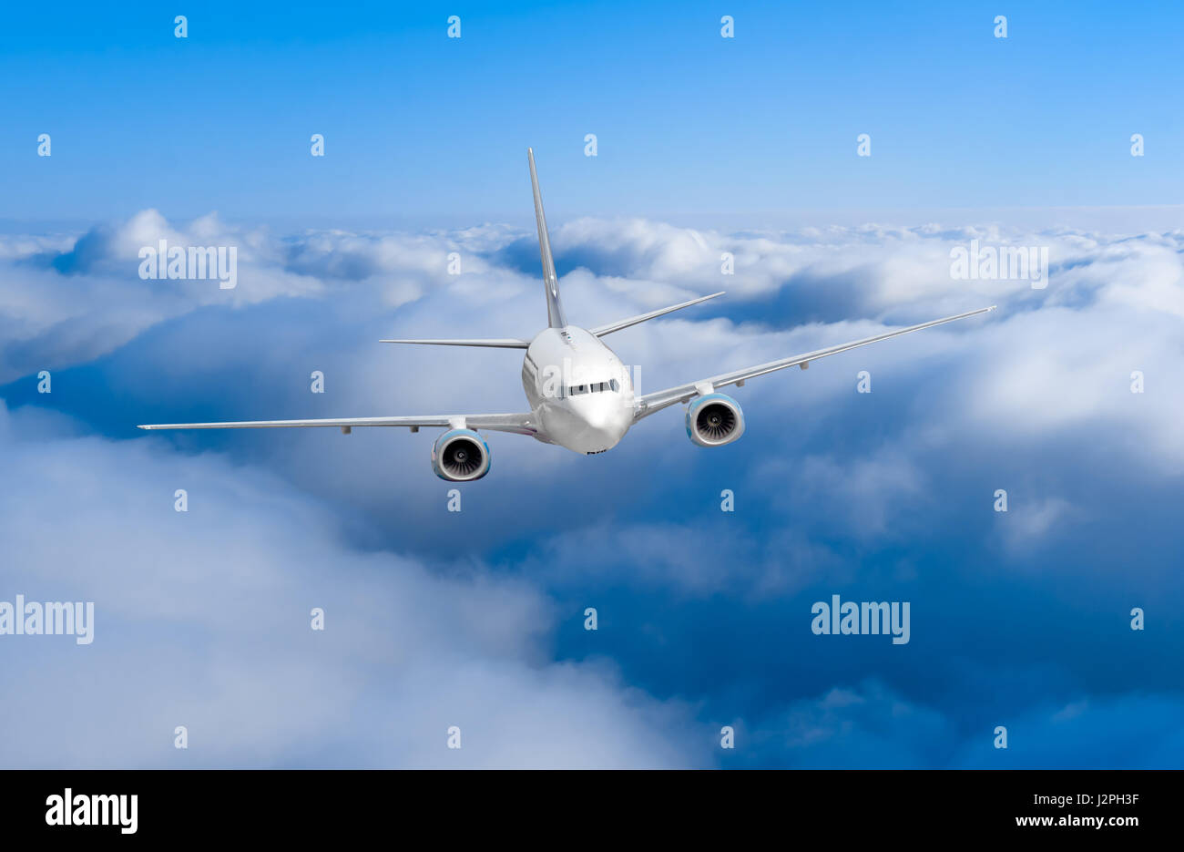 airplane in the sky. Passenger jet air plane flying on blue sky white ...