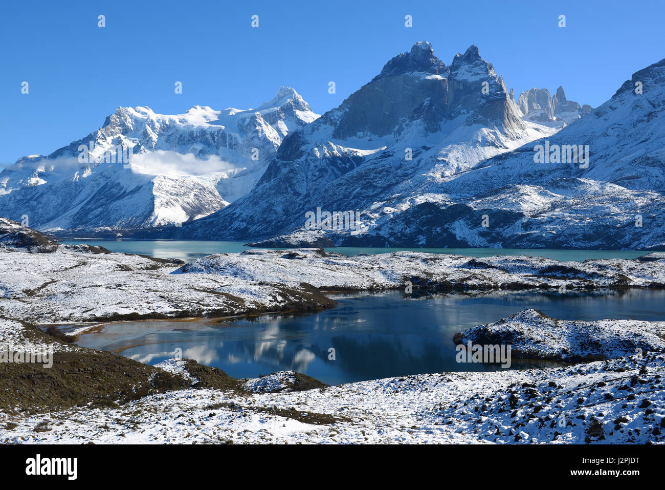 The beautiful Nordenskjold lake in winter located inside the Torres del Paine national park with a view over the Cuernos del Paine, Patagonia, Chile. Stock Photo