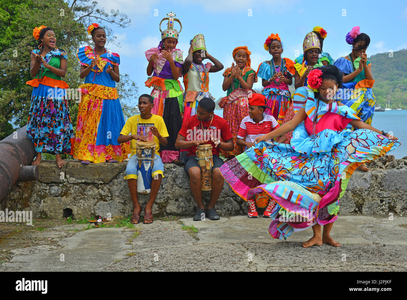 Traditional congo dance performance inside the Spanish fortress of Santiago in Portobelo, Panama. The panamanian dancers wear traditional clothing. Stock Photo