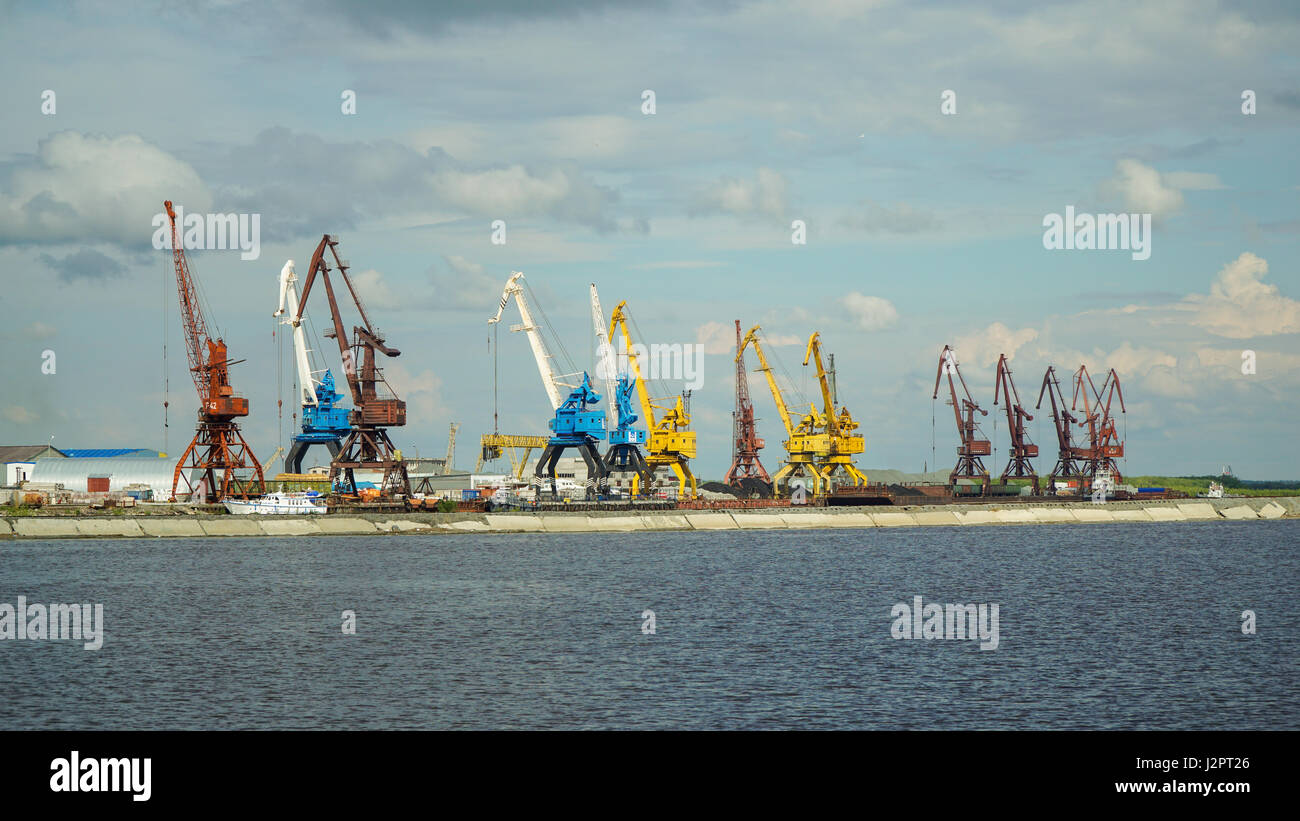 Views of the cranes in the port city of Labytnangi on the river Ob in the summer Stock Photo
