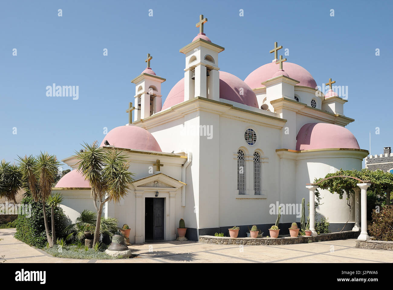 Greek Orthodox church of the Twelve Apostles on the edge of the Sea of Galilee at Capernaum Stock Photo