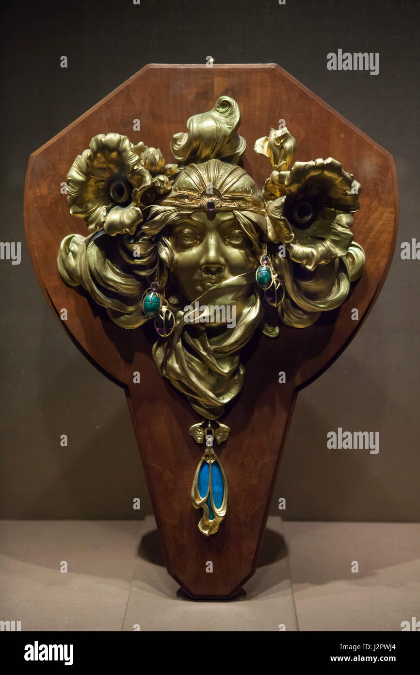Distant Princess. Art Nouveau wall lamp designed by Czech artist Alfons Mucha (1900) on display in the Royal Museums of Fine Arts in Brussels, Belgium. Stock Photo