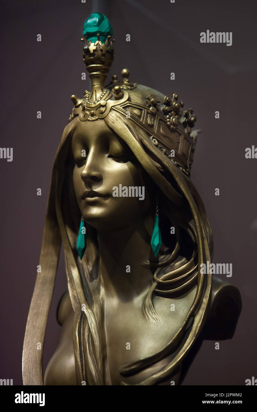 Nature. Art Nouveau gilded bronze statuette designed by Czech artist Alfons Mucha with malachite ornaments executed by French sculptor Emile Pinedo (1899-1900) on display in the Royal Museums of Fine Arts in Brussels, Belgium. Stock Photo