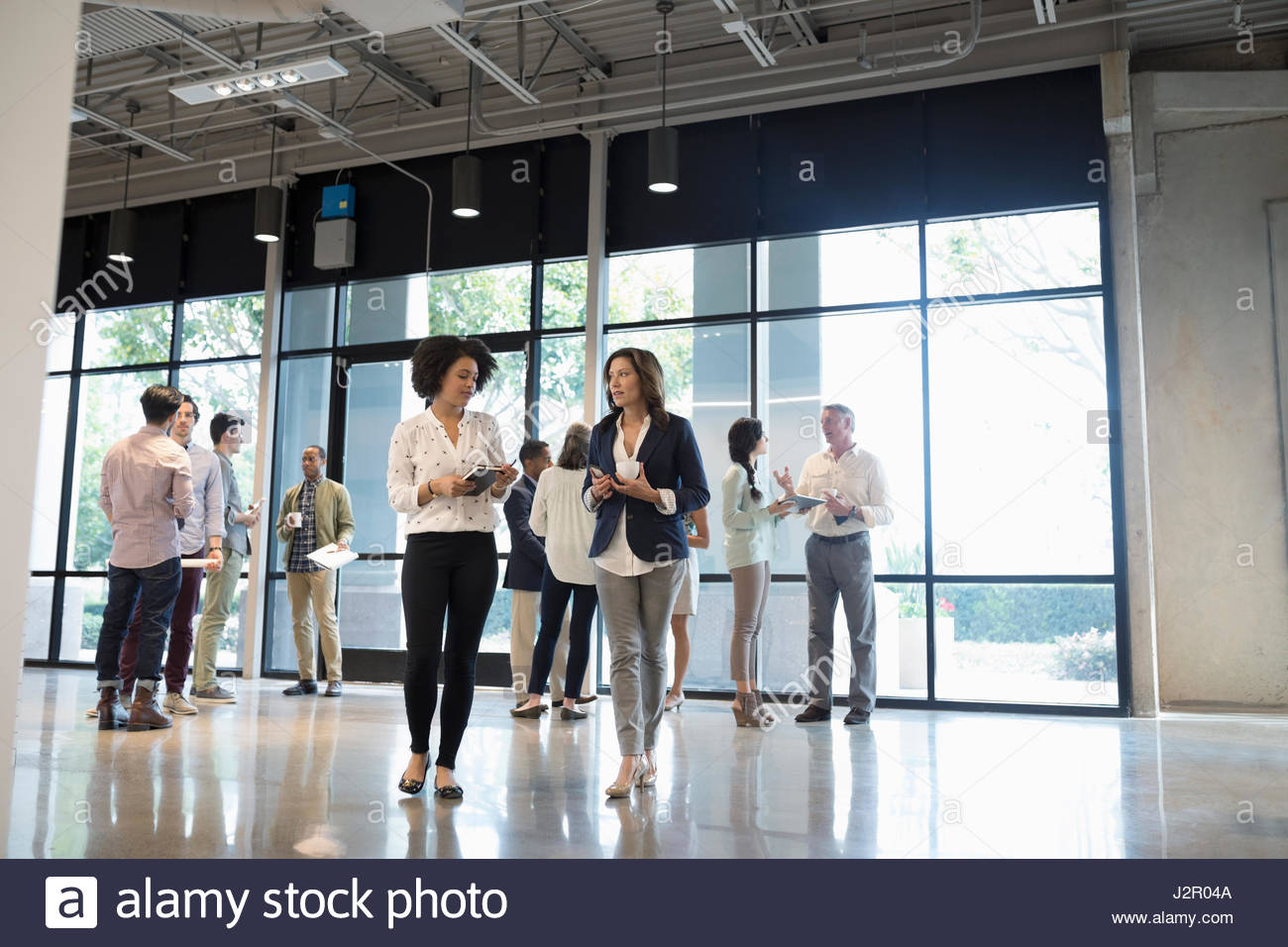 Group young people walking low angle hi-res stock photography and ...