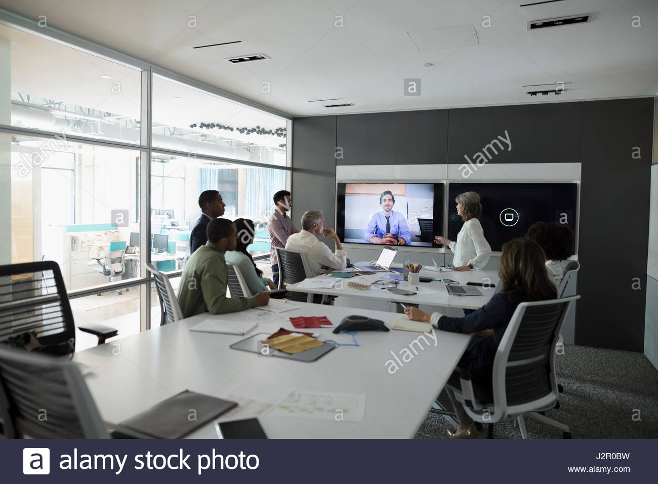 Architects video conferencing in conference room meeting Stock Photo Alamy