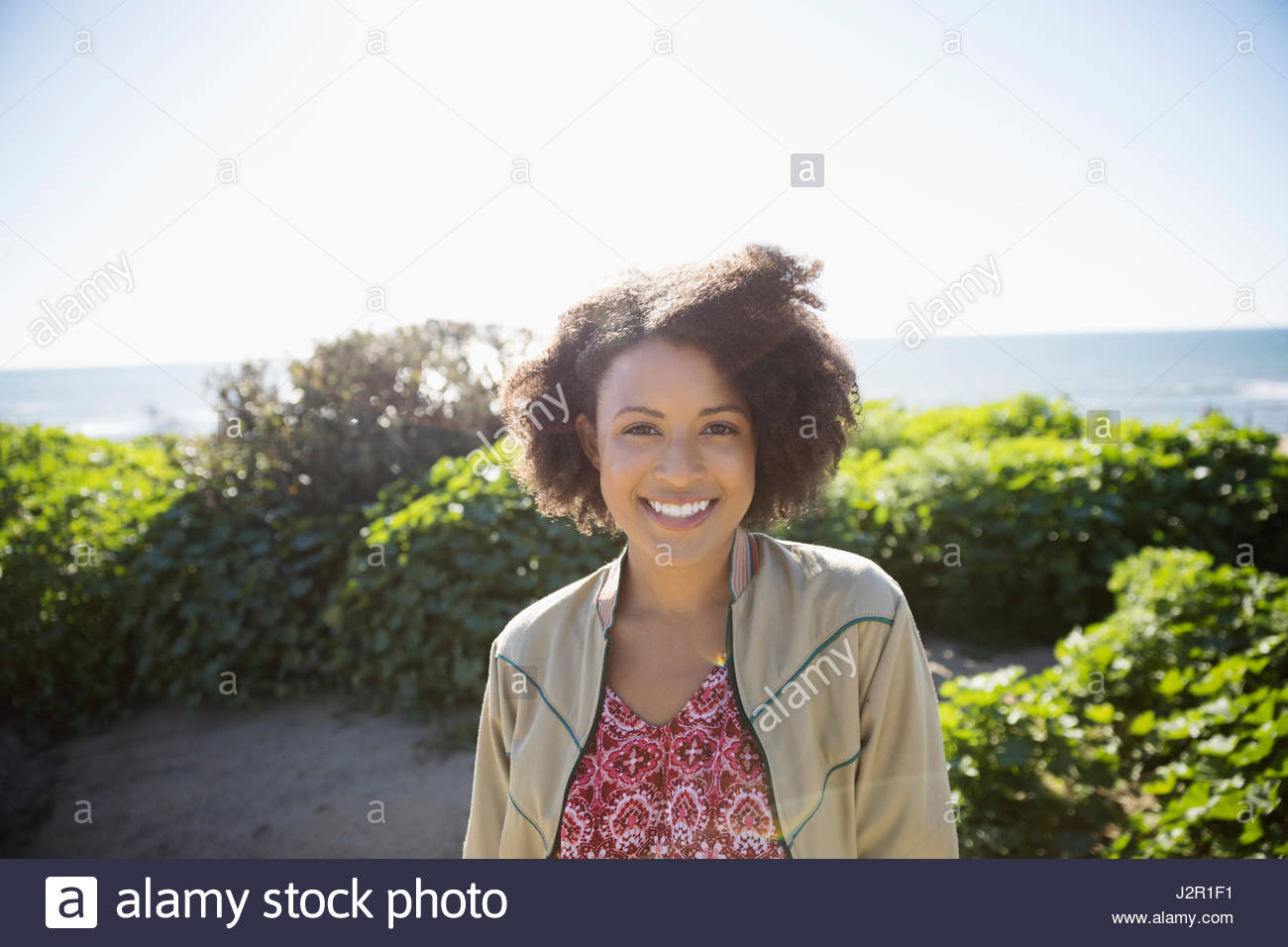 Woman young posing at on the beach hi-res stock photography and images ...