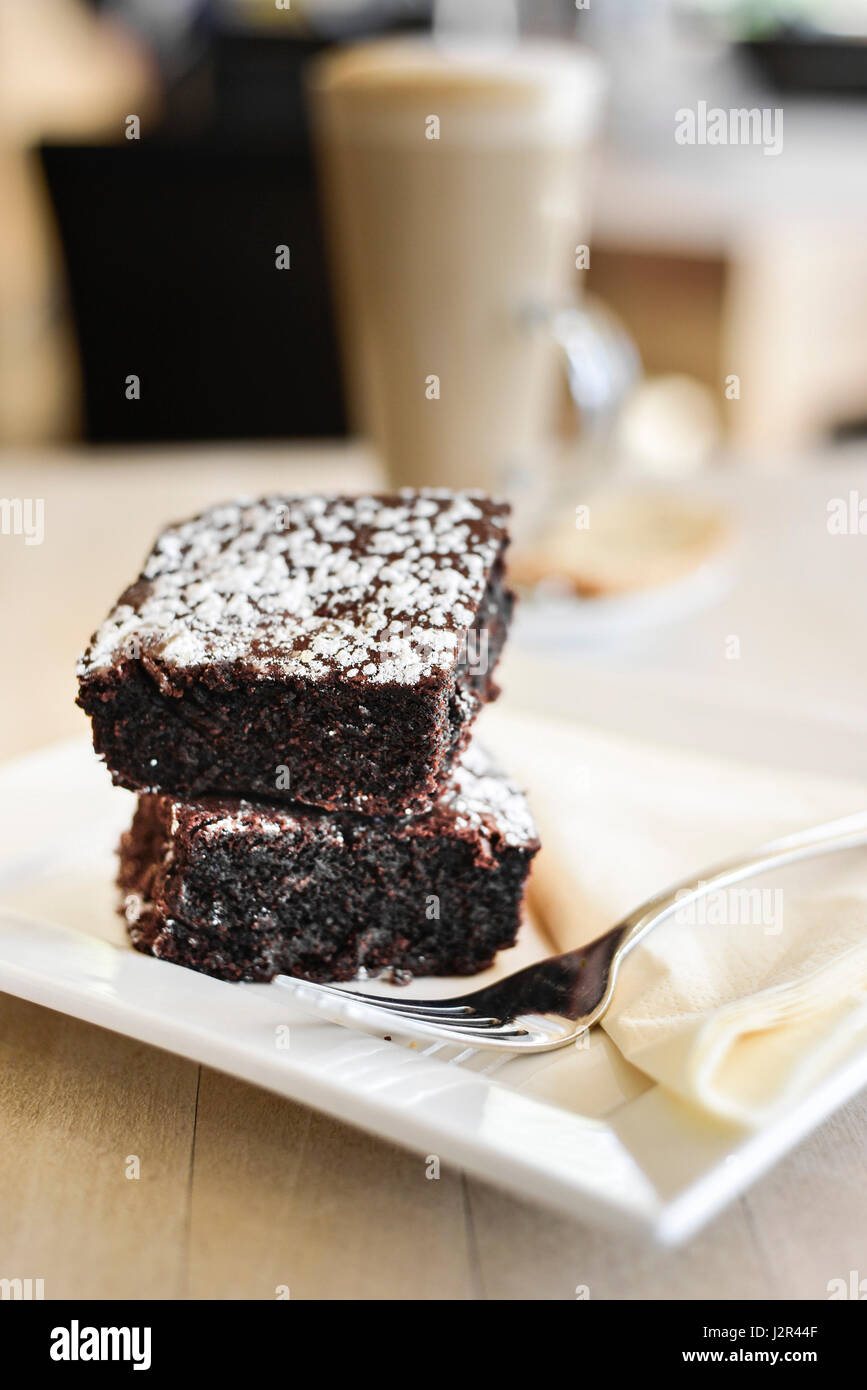 Food Two Chocolate Brownies Dessert Pudding Sweet Treat Chocolate brownies Baked Baking Fork Plate Stock Photo