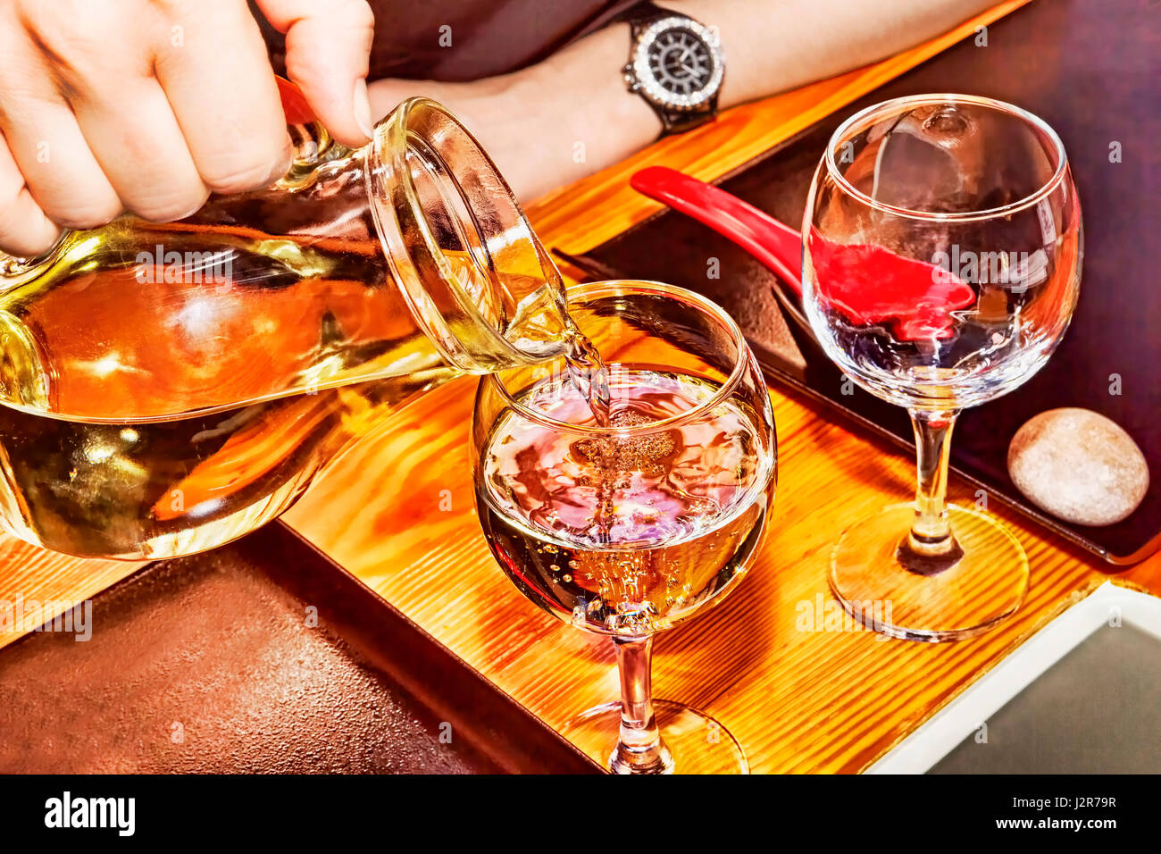 Pour white wine at Japanese restaurant Stock Photo Alamy