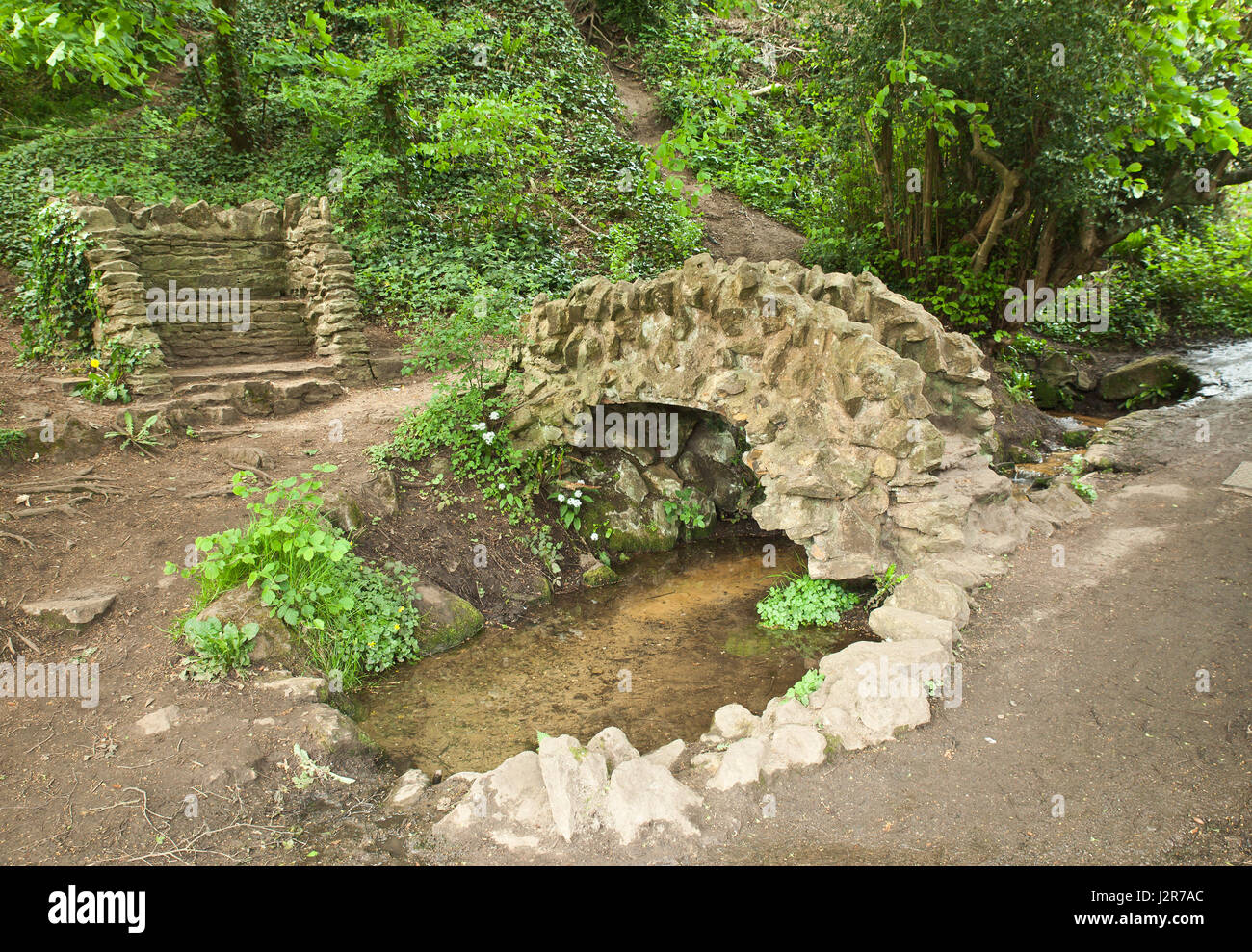 Ferry Lane beside the river Wey Navigations canal, a Victorian Grotto built around a natural spring. Stock Photo