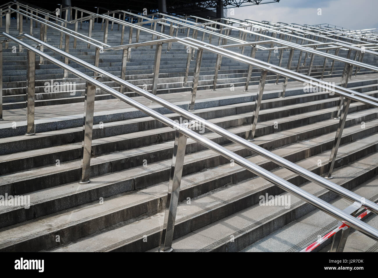 Metal railings and steps. Ladder with metal handrails. Chromium ...
