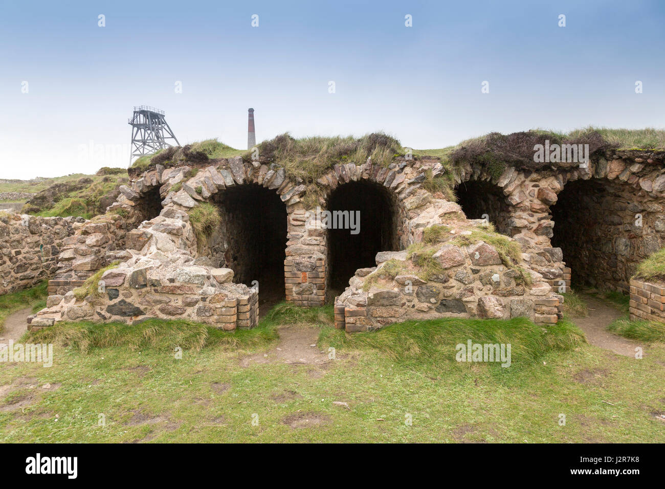 The preserved remains of the 1906 arsenic works condensing chambers on the cliff top at Botallack, Cornwall, England Stock Photo