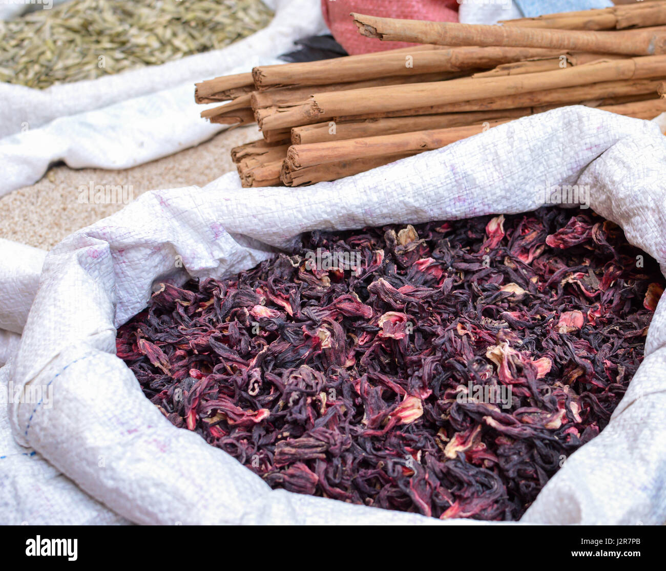 Hibiscus and cinnamon at the traditional market in a small colonial town of Totonicapan, Guatemala. Hibiscus, also called Jamaica, is the most traditi Stock Photo