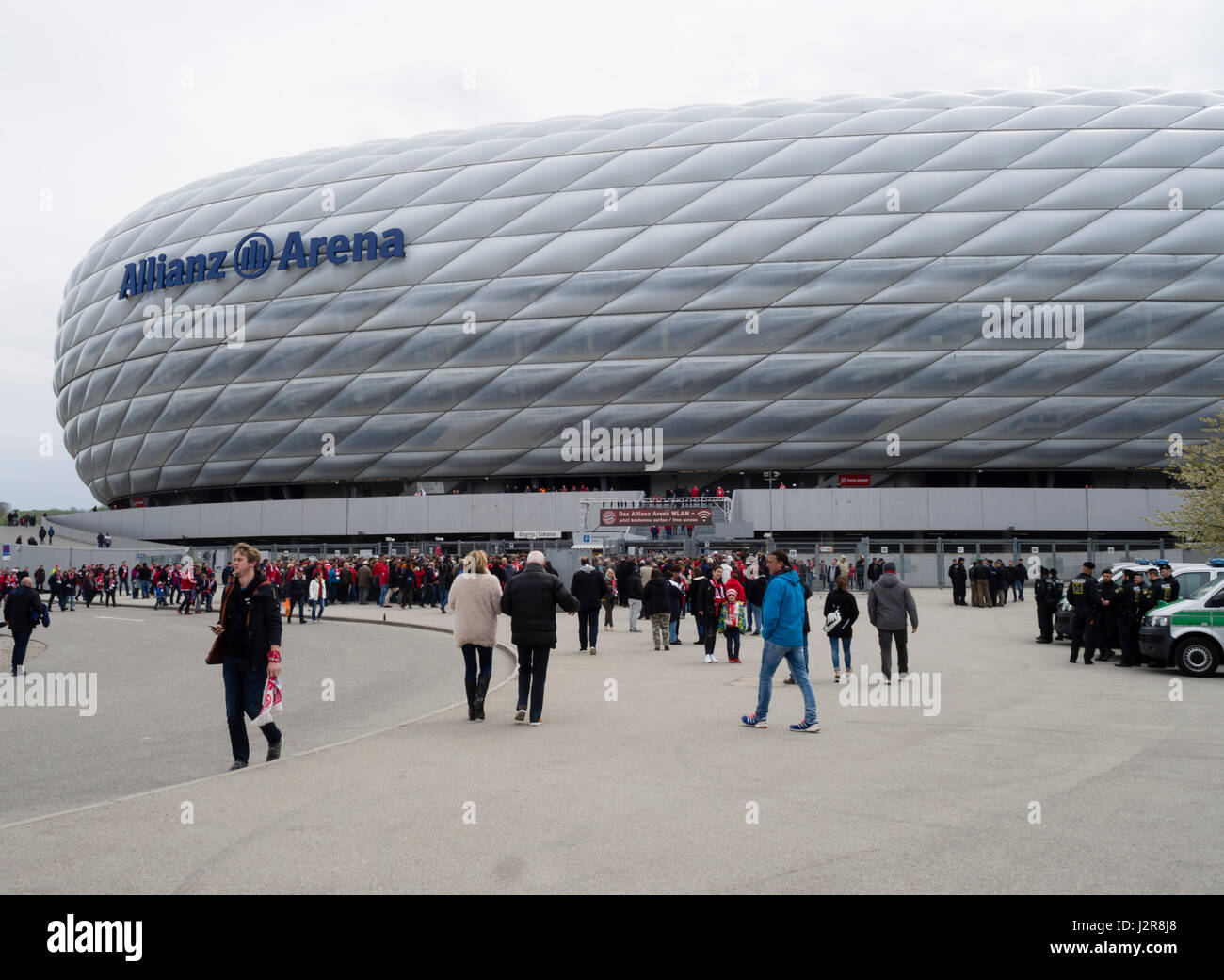 Munich, Germany - 22 April 2017: Football fans are entering the Allianz Arena football stadium in Munich, Germany. With 75'000 seats, Allianz Arena is Stock Photo
