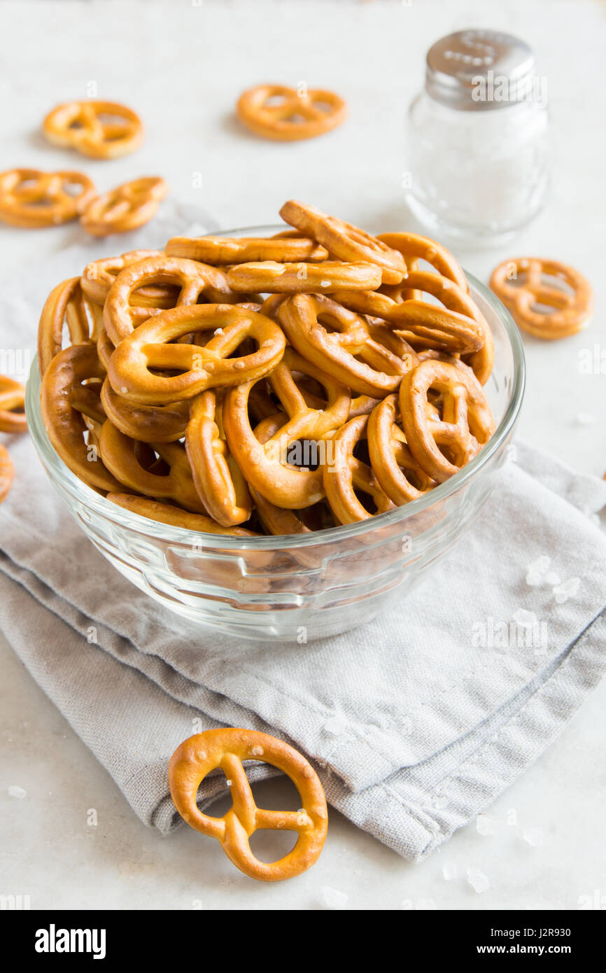Salty Mini Pretzels with Salt in a Bowl homemade organic snack for