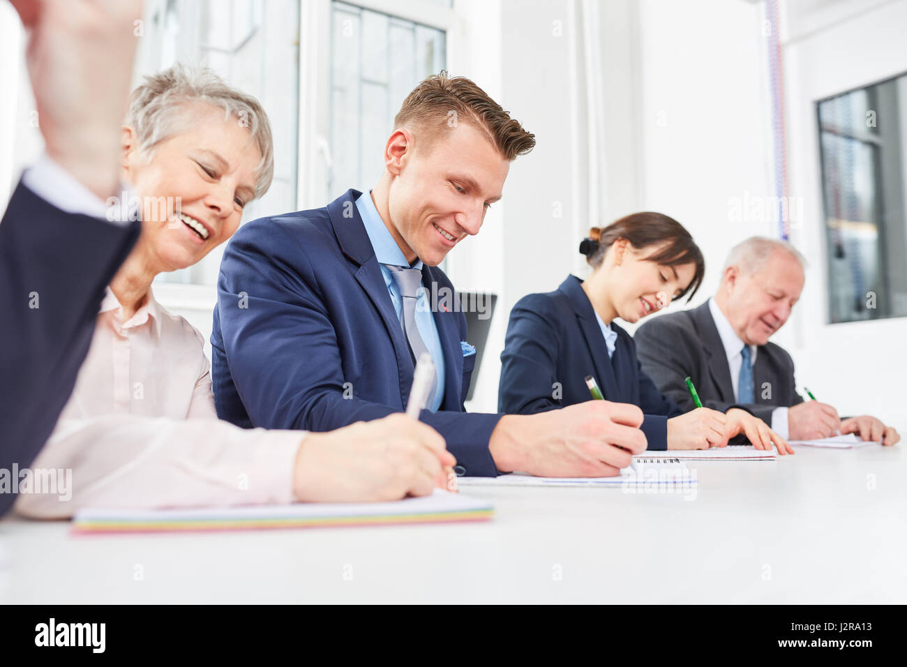 Employee staff in training taking qualification test in assessment center Stock Photo
