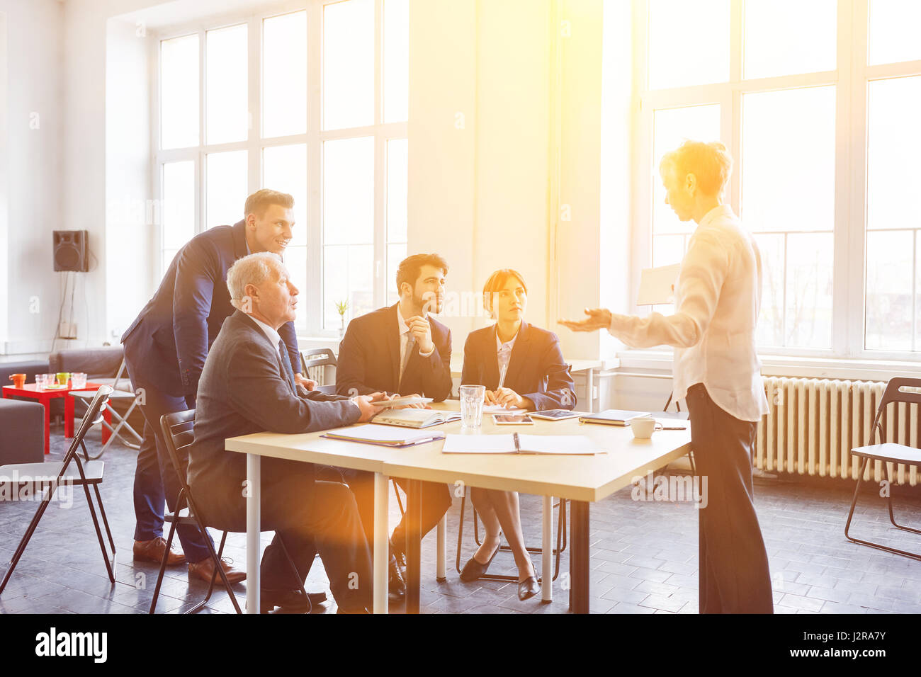 Woman gives business consulting workshop in conference room Stock Photo ...