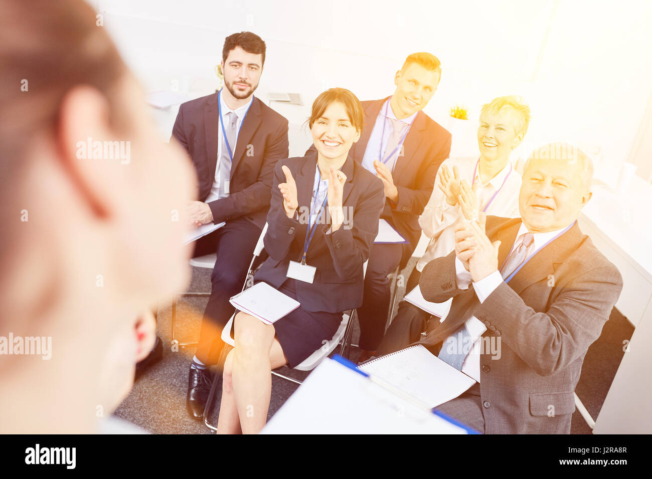 Business people as audience clap hands after business workshop Stock Photo