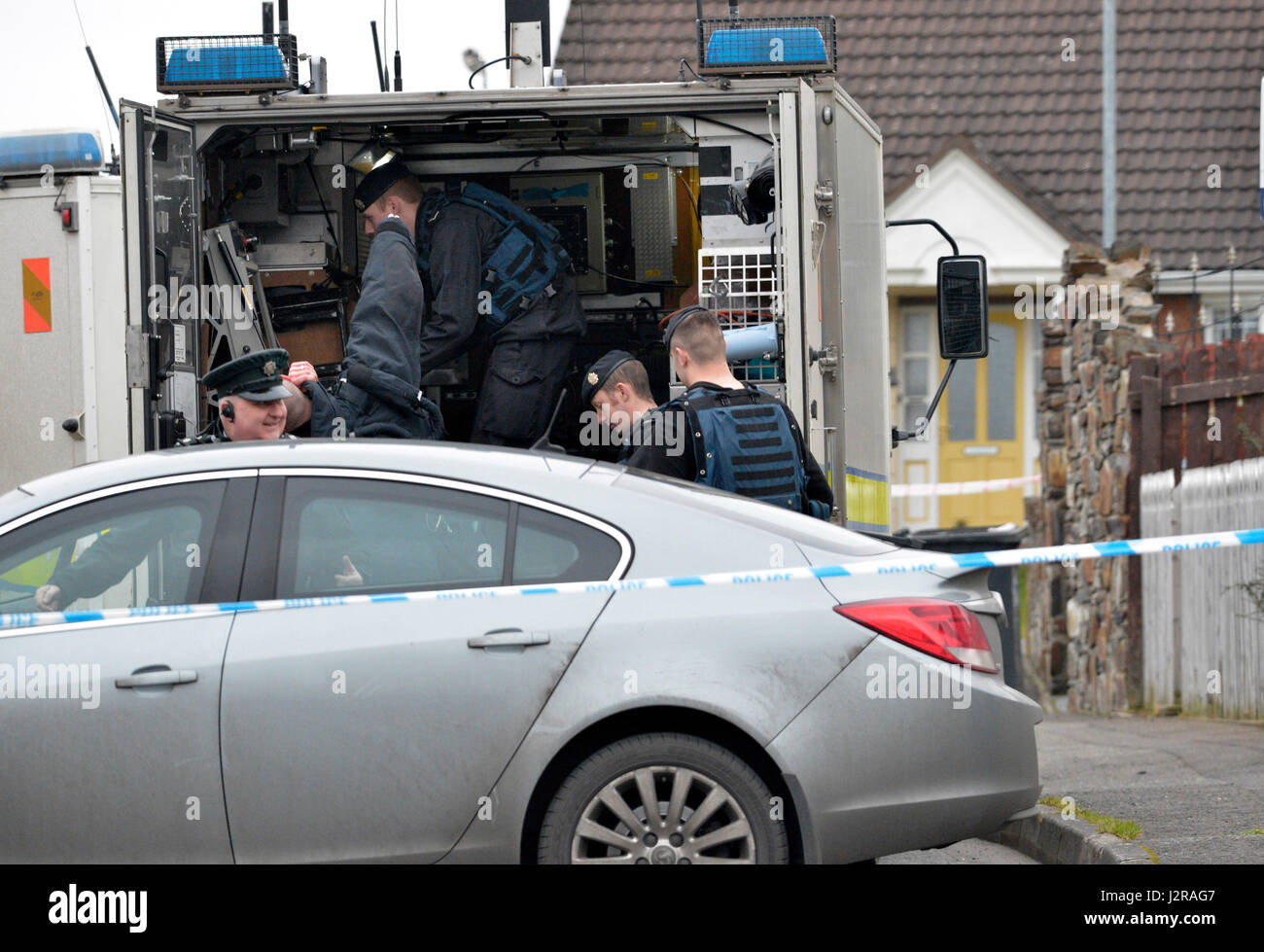 Army technical support officers at the scene of a security alert in Derry, Londonderry, Northern Ireland. Stock Photo