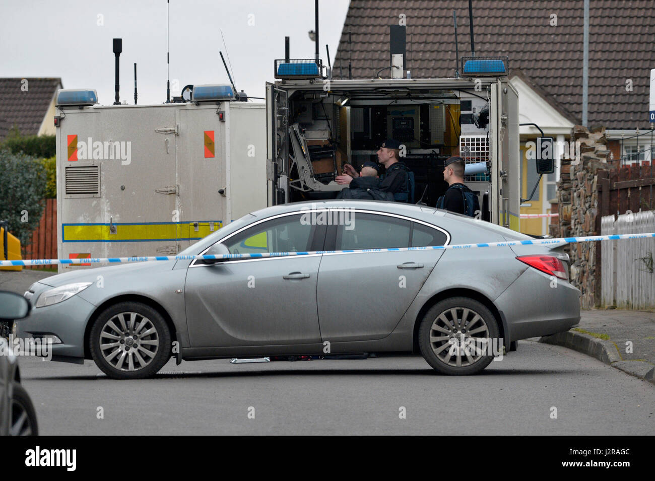 Army technical support officers at the scene of a security alert in Derry, Londonderry, Northern Ireland. Stock Photo