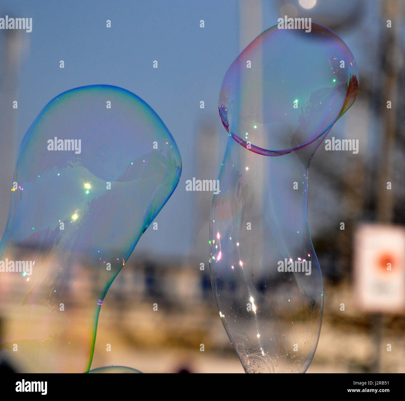 Playing with soap bubbles on the street of Gdynia, Poland, spring time