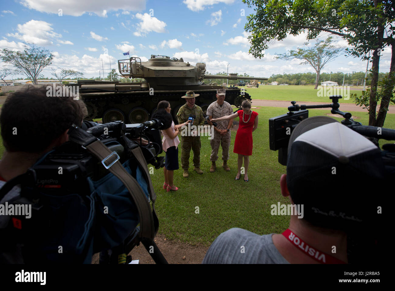 ROBERTSON BARRACKS, Darwin – U.S. Marine Lt. Col. Brian Middleton, commanding officer of 3rd Battalion, 4th Marine Regiment, 1st Marine Division, Marine Rotational Force Darwin 17.2 and 1st Brigade headquarters Chief of Staff, James Ryan, Australian Army, answer questions for local media outlets after a Welcome to Country ceremony in Australia, April 21, 2017. The ceremony is a symbol of the strong partnership between the U.S. and Australia. (U.S. Marine Corps photo by Lance Cpl. Damion Hatch Jr) Stock Photo