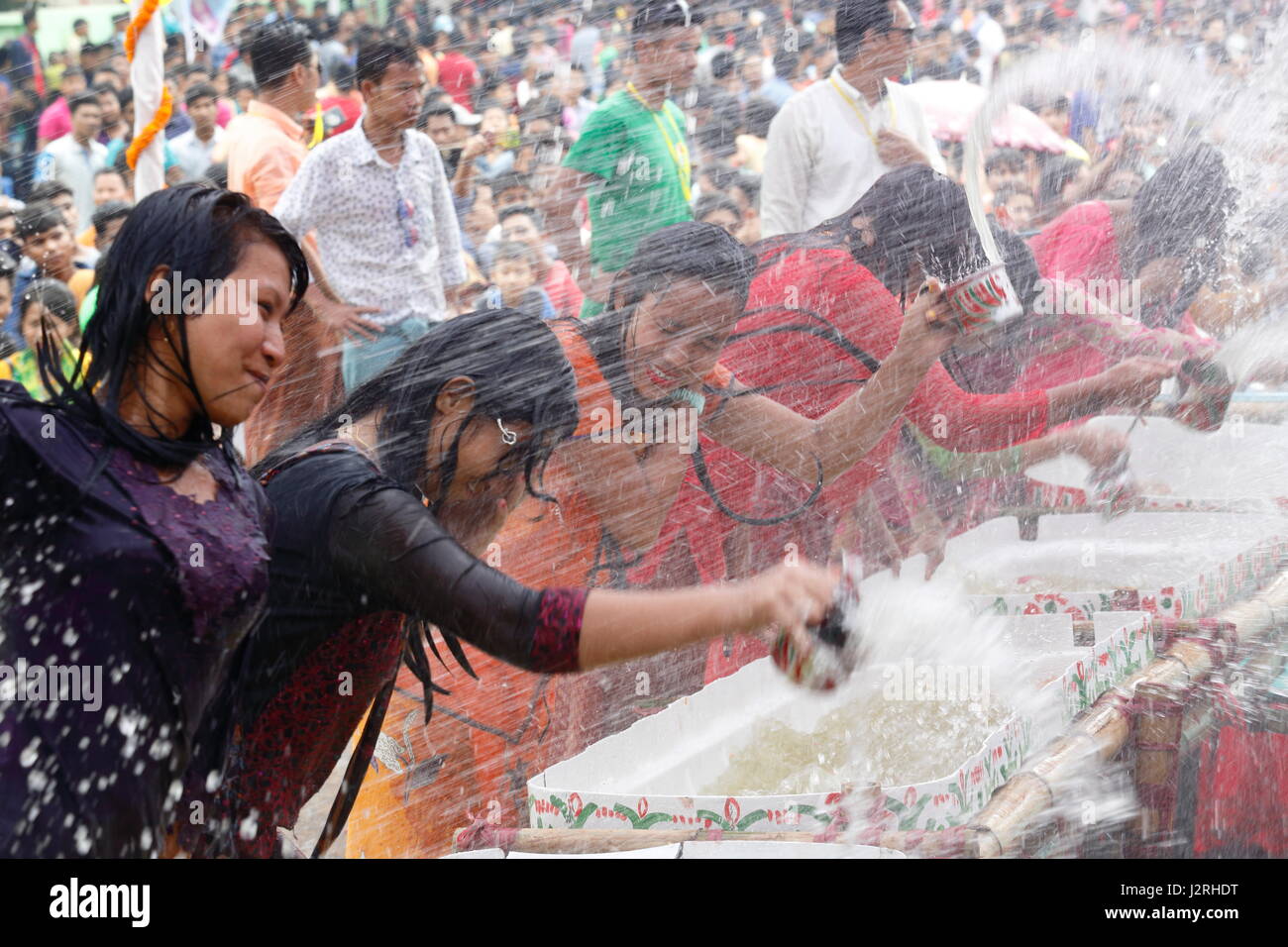 Ethnic Marma girls participate on water festival on occasion of Baisabi festival. It is a part of their New Year celebration. Rangamati, Bangladesh. Stock Photo