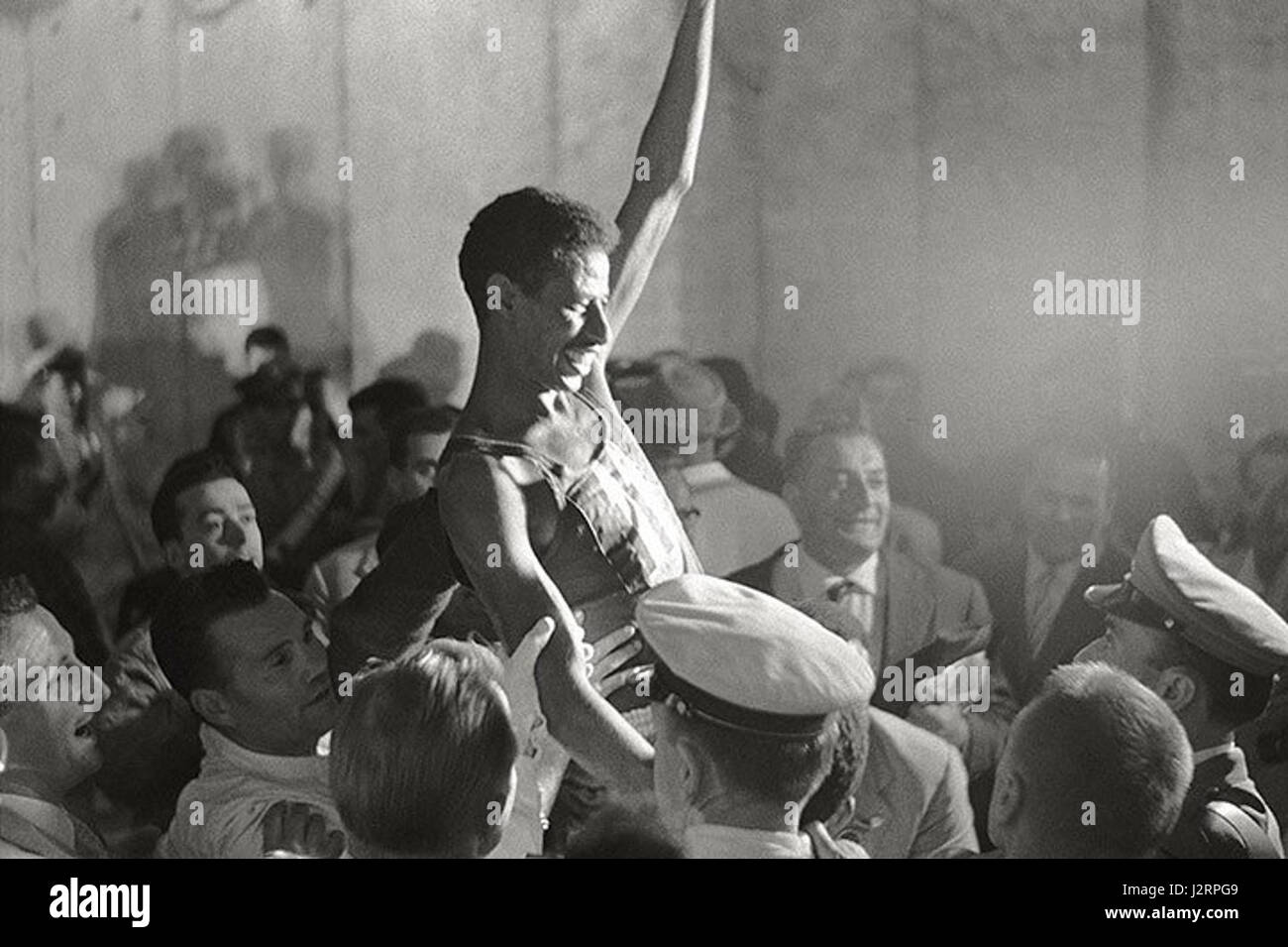 Abebe Bikila rejoicing. He's the gold medal winner in the marathon. Rome, 1960 Stock Photo