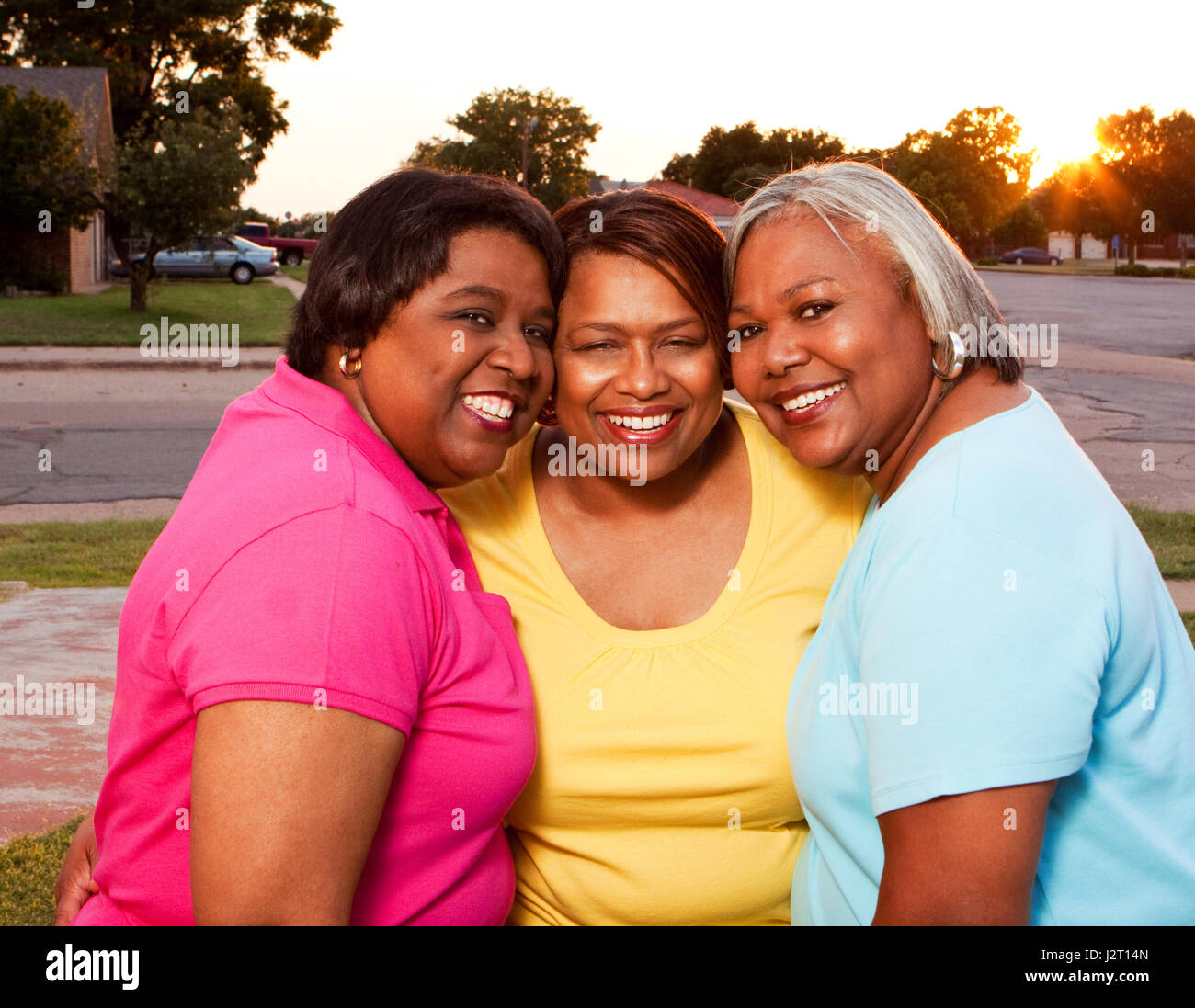 Mature group of women talking and laughing Stock Photo - Alamy