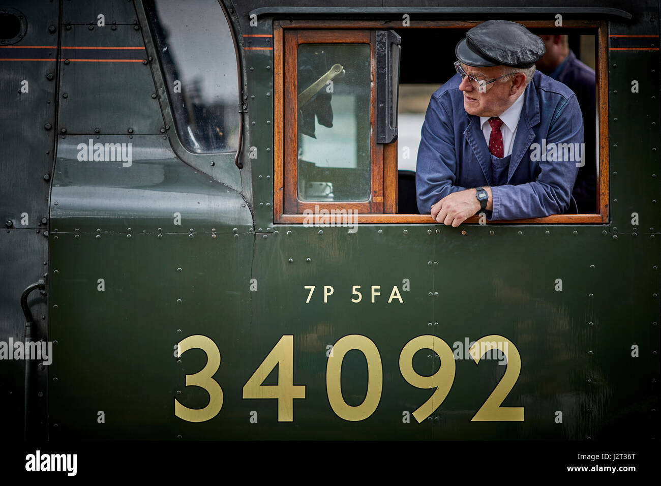 Driver leaning at window on ELR East Lancashire Railway, a preserved heritage line in Bury Greater Manchester, Stock Photo