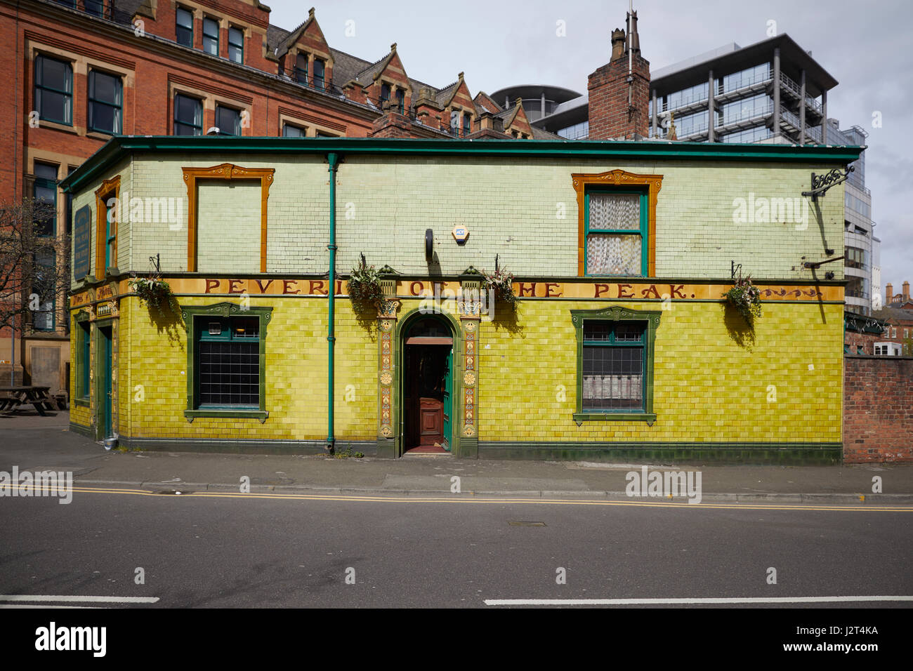 Landmark Manchester green tiled clad Victorian pub Peveril of the Peak Stock Photo