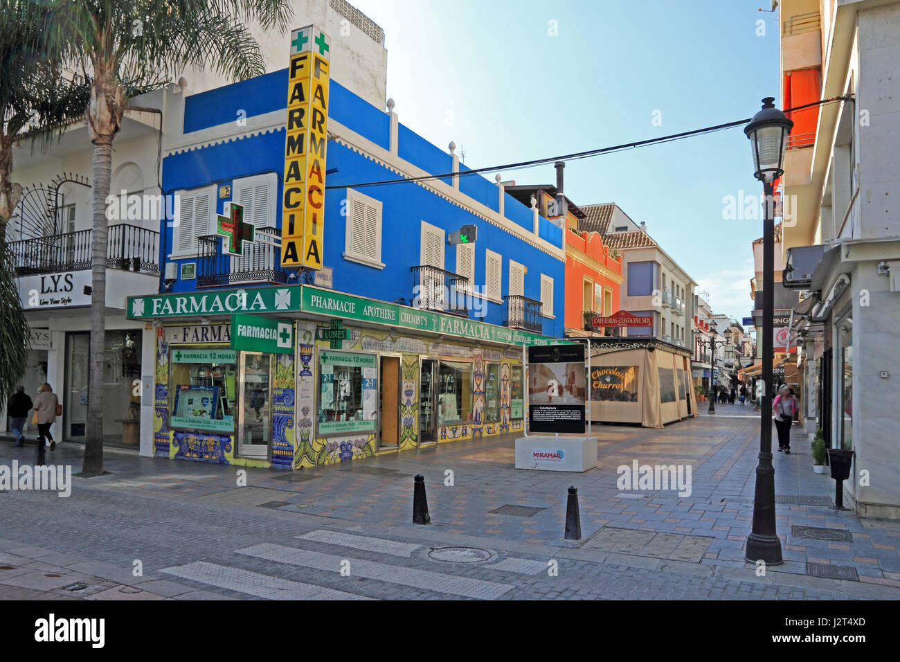Farmacia Pharmacy) with brightly coloured and tiled exterior, Fuengirola, Spain Stock Photo