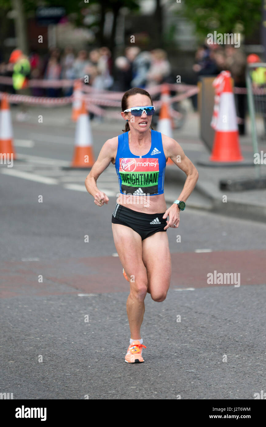 Lisa Weightman running in the Virgin Money London Marathon 2017, The Highway, London, UK. Stock Photo