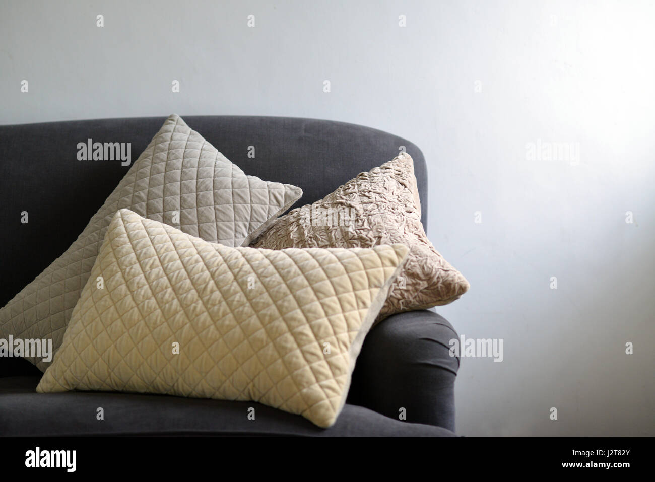 Textured cushions on a couch Stock Photo
