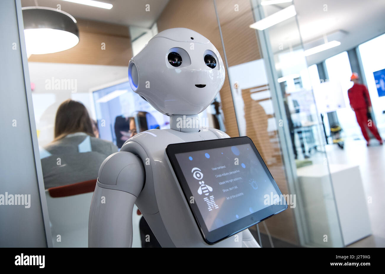 Munich, Germany. 26th Apr, 2017. The robot 'Pepper' can be seen at a showroom in the headquarters of IBM in Munich, Germany, 26 April 2017. Pepper is a humanoid robot programmed to analyse people's facial expressions and gestures. Photo: Sven Hoppe/dpa/Alamy Live News Stock Photo