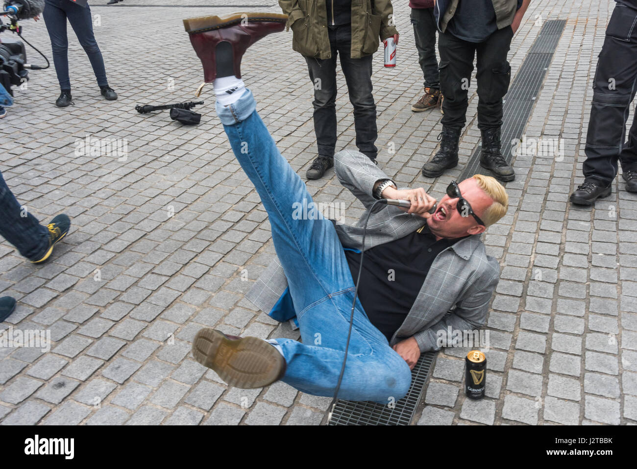 London, UK. 30th April 2017.  Adam Clifford (aka Jimmy Kunt) ends his performance in typical style at the Class War protest against gentrification outside Bermondsey's White Cube gallery. There were also performances by Cosmo, Potent Whisper nd others, along with speeches by Simon Elmer of ASH, Martin Wright and Ian Bone. Credit: Peter Marshall/Alamy Live News Stock Photo