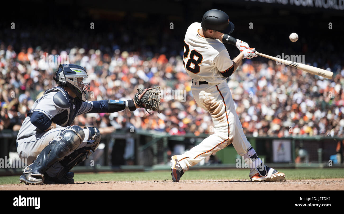San Francisco, California, USA. 30th Apr, 2017. San Francisco Giants catcher Buster Posey (28) makes contact during a MLB game between the San Diego Padres and the San Francisco Giants at AT&T Park in San Francisco, California. Valerie Shoaps/CSM/Alamy Live News Stock Photo
