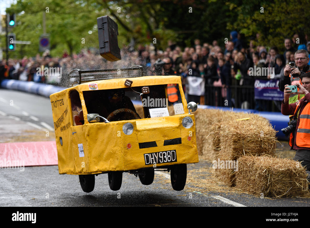 Soapbox, or soap box, derby carts leap over the jump ramps during an