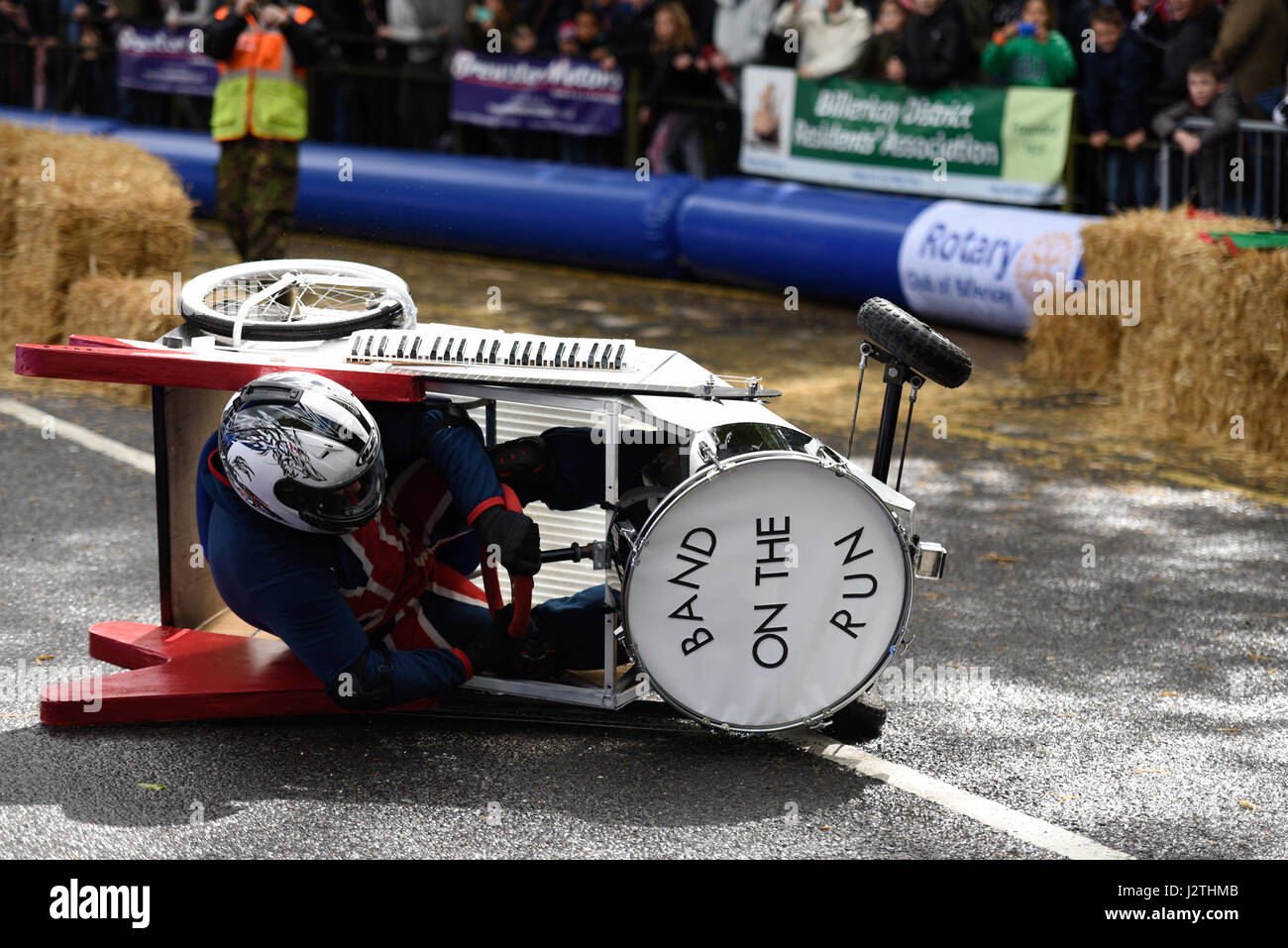 Soapbox, or soap box, derby carts leap over the jump ramps during an