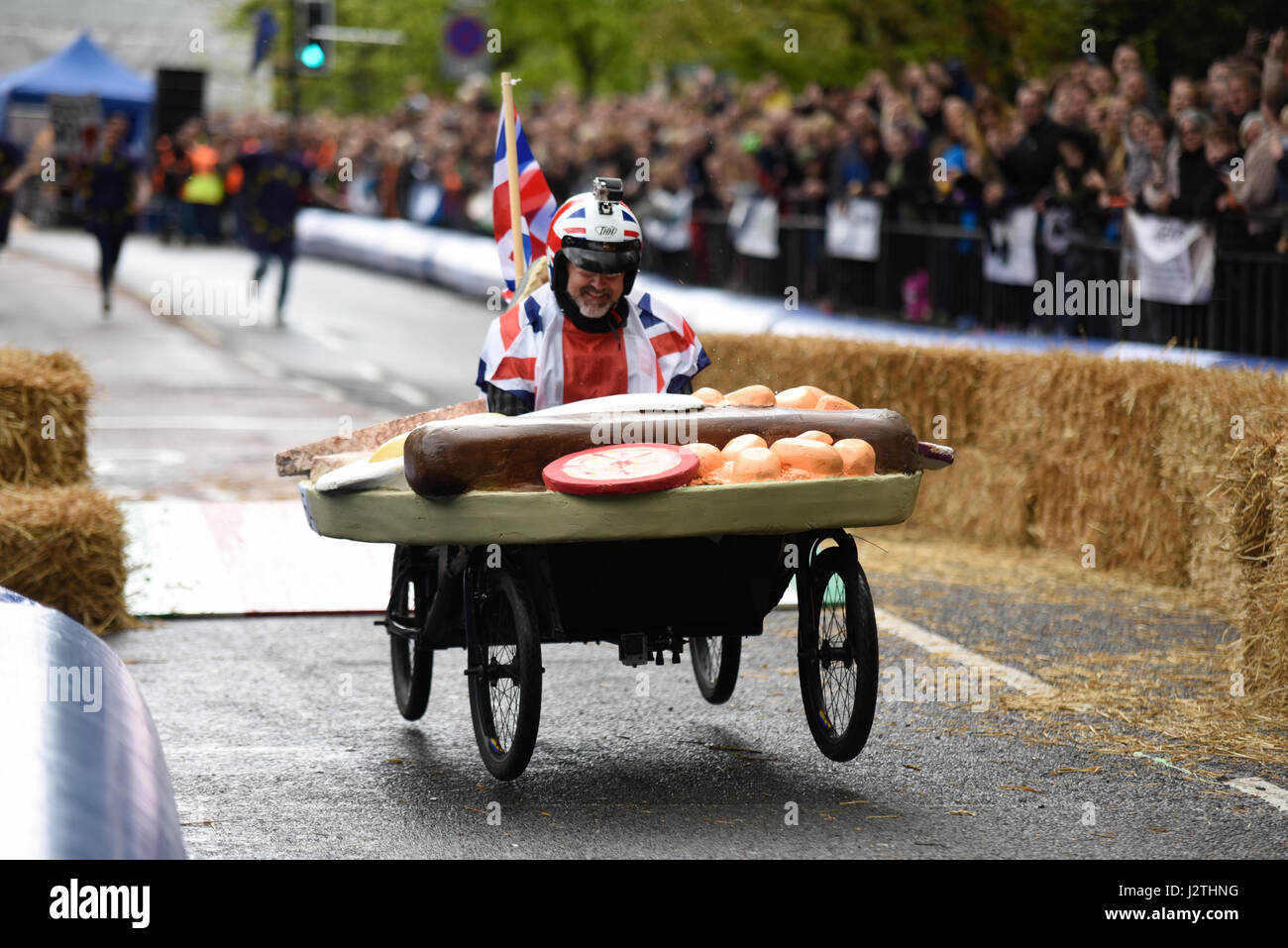 Soapbox, or soap box, derby carts leap over the jump ramps during an