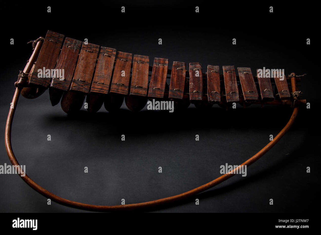 African music instrument, wooden marimba with two bakets, isolated on ...