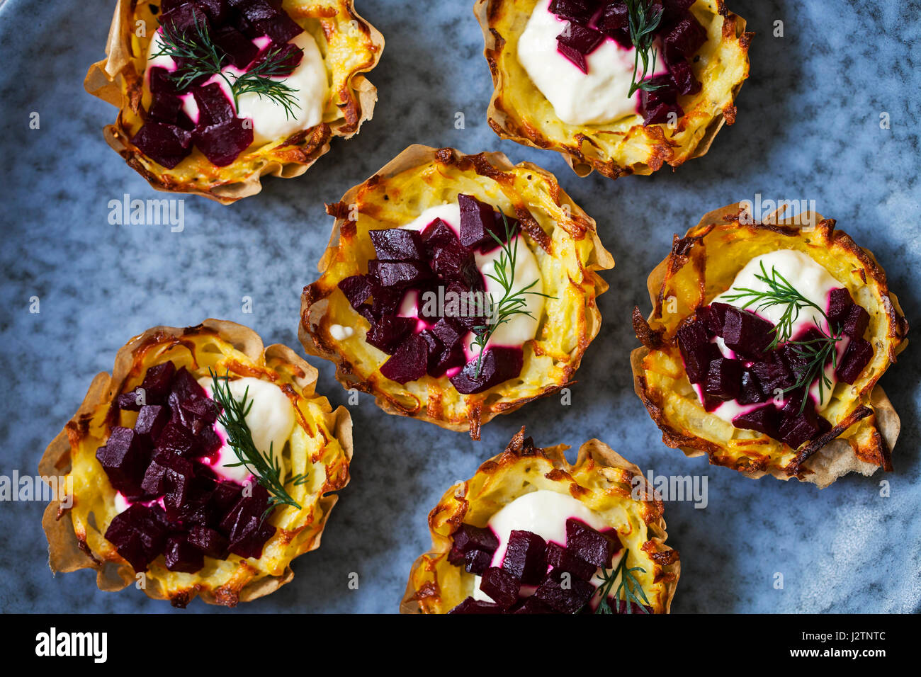 Potato rosti with beetroot and horseradish Stock Photo Alamy