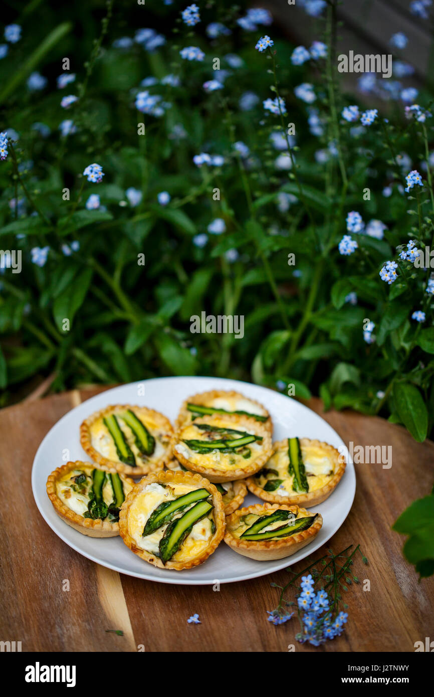 Asparagus and goat cheese tartlets Stock Photo